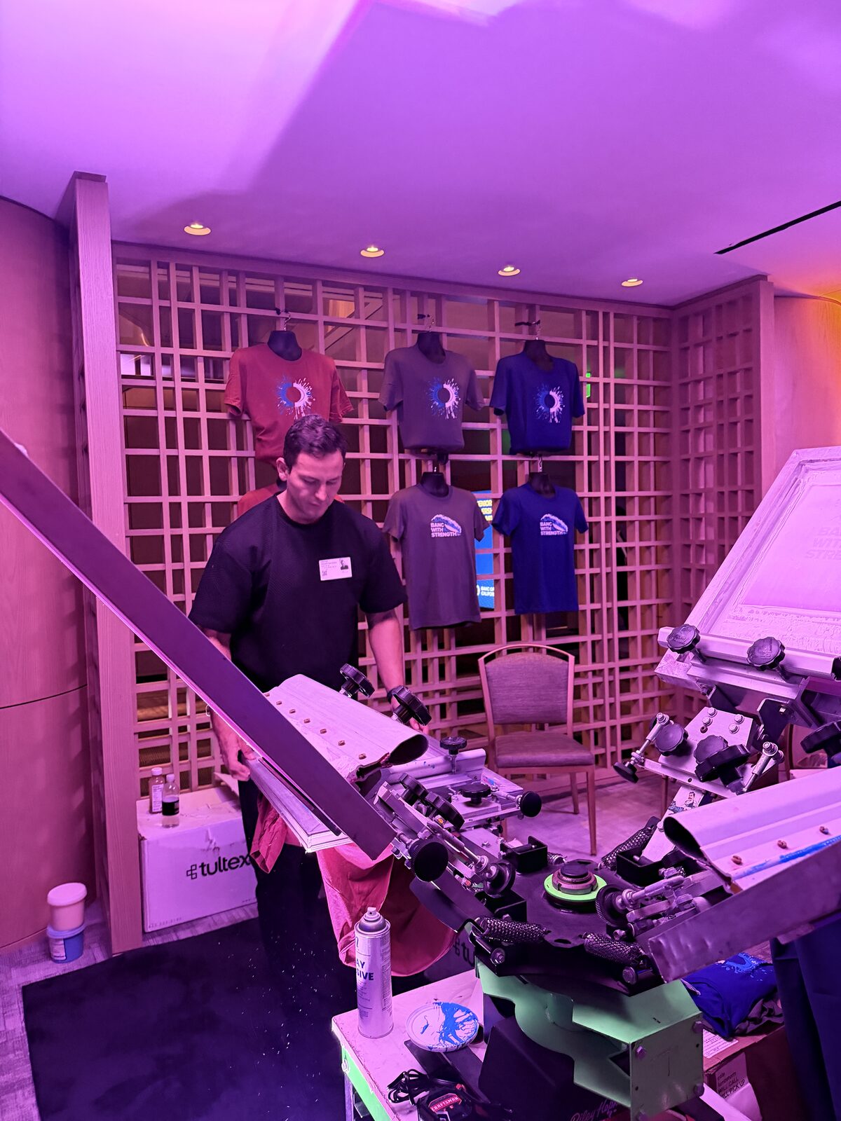 Loading a blank shirt onto a press platen